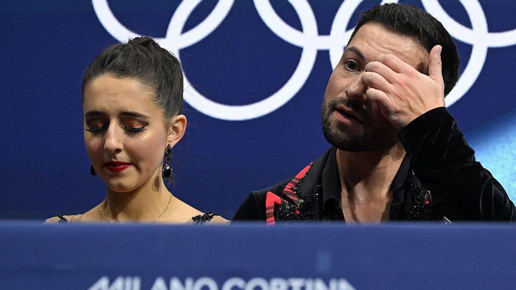 lilah fear and lewis gibson looking sad.