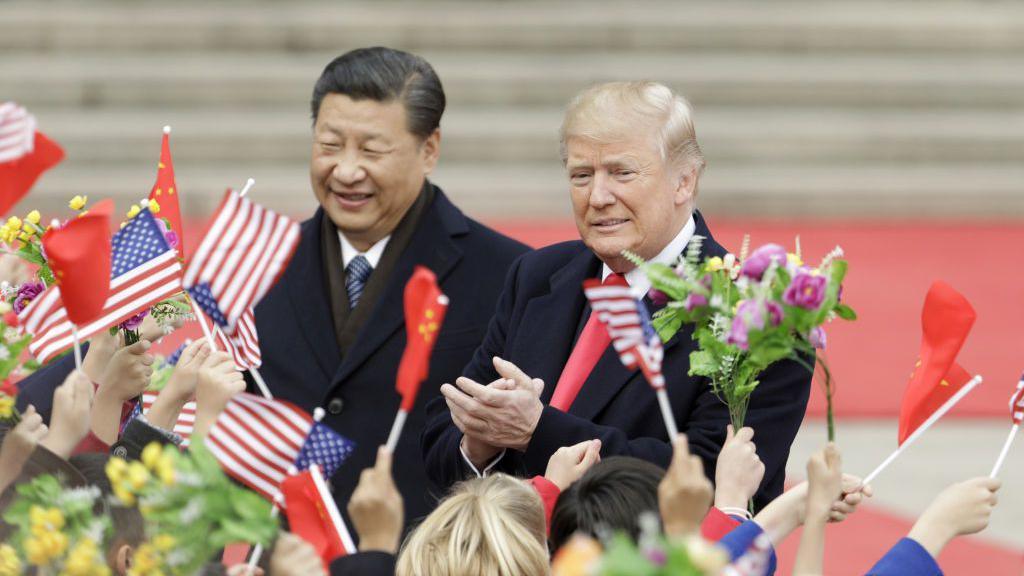 Then-US president Donald Trump and Chinese President Xi Jinping at a ceremony in Beijing in 2017.