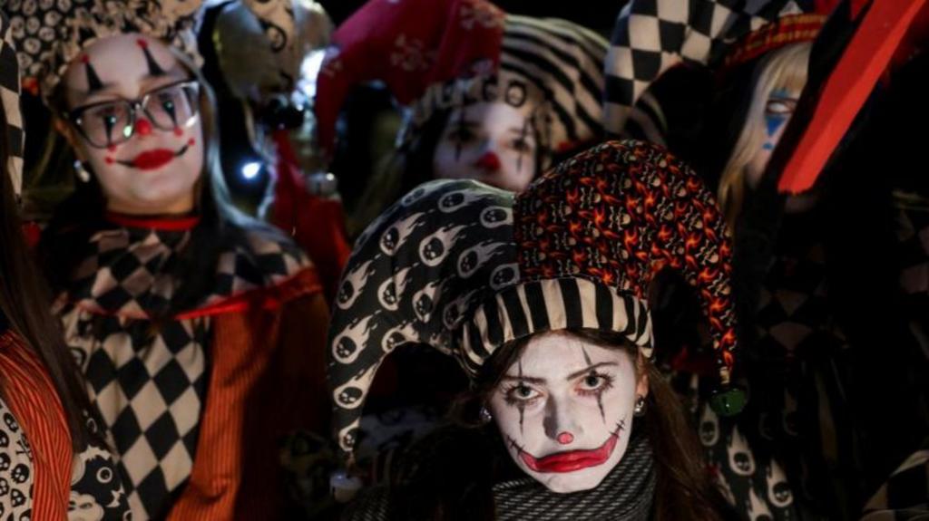 Women dressed as scary clowns at the Derry festival