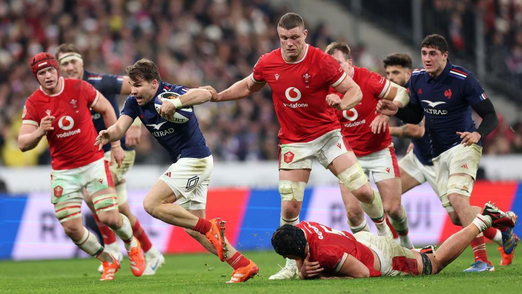 France captain Antoine Dupont makes a break in the 2025 Six Nations opener against Wales