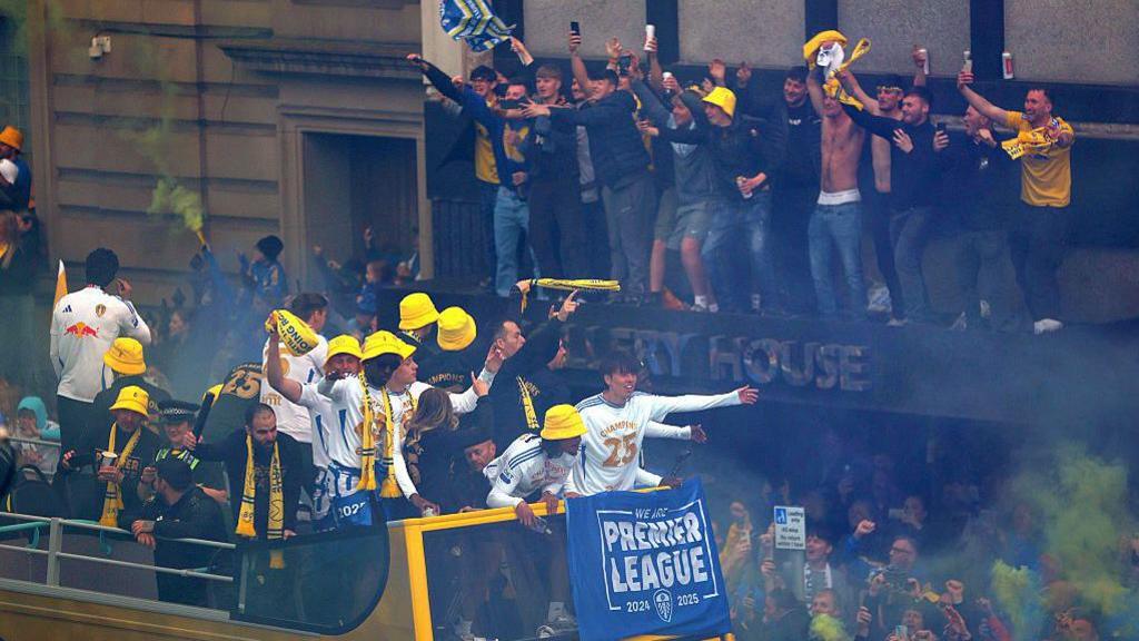 Fans celebrate at Leeds promotion parade
