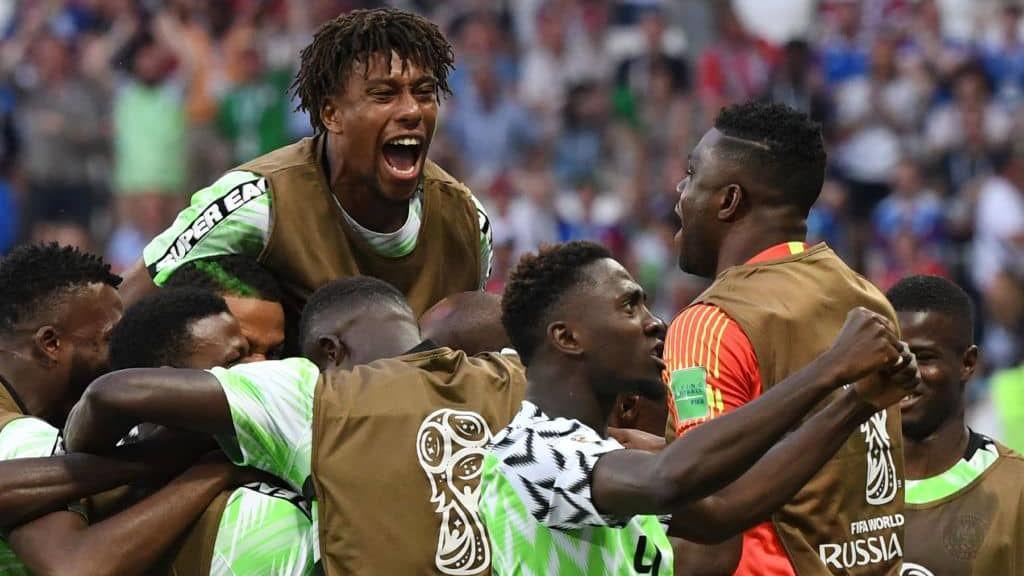 Nigeria's players in green jersey and football training bib celebrate after scoring against Iceland during the Russia 2018 World Cup