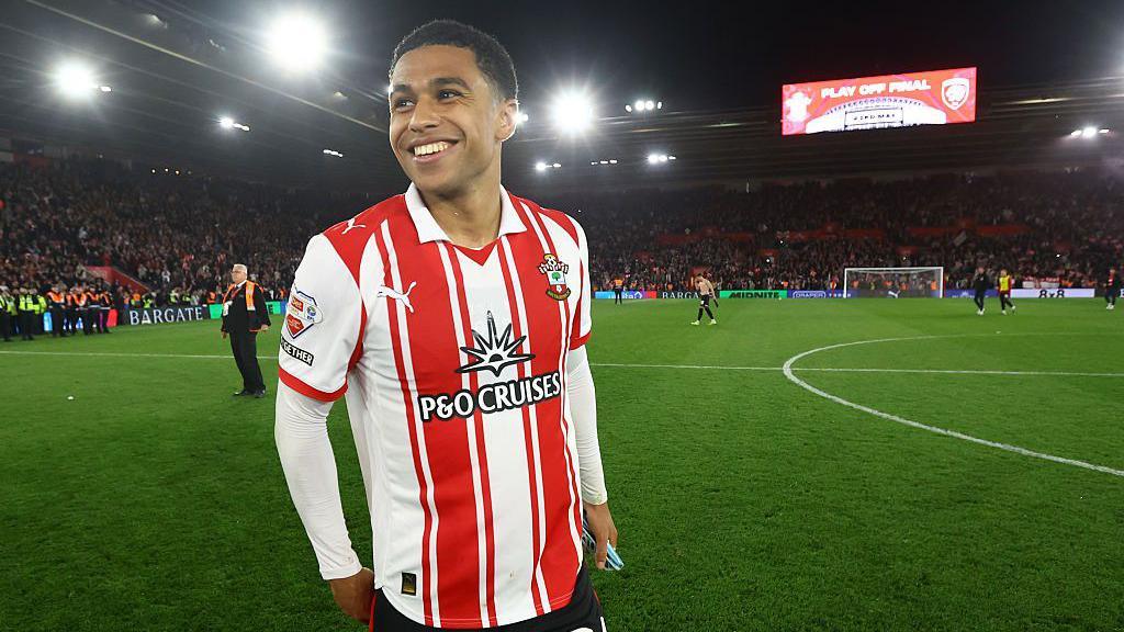 Shea Charles smiles on the pitch at St Mary's after Southampton beat Middlesbrough in the play-offs