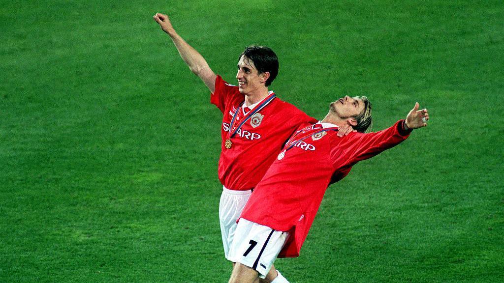 Gary Neville and David Beckham of Manchester United celebrate after winning the 1999 Champions League final