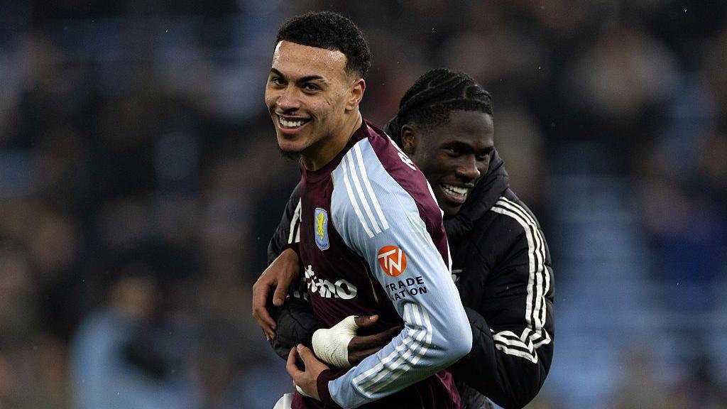 Morgan Rogers and Amadou Onana celebrate victory for Aston Villa