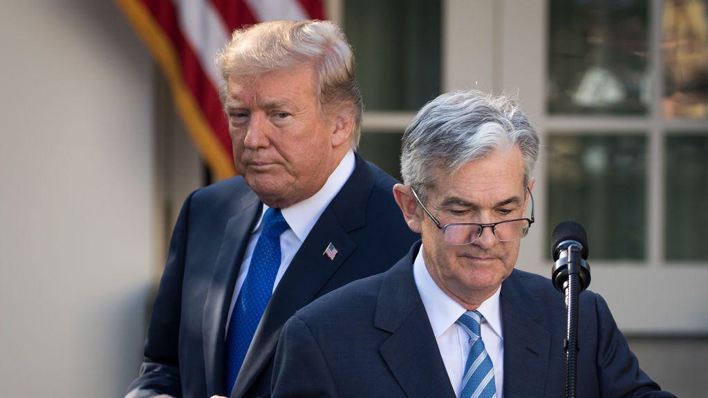 Donald Trump looms in the background over US central bank chairman Jerome Powell in this picture from 2017 when Trump named him to lead the Fed