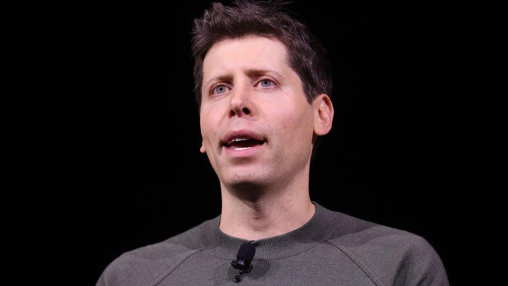 Sam Altman speaking at an event