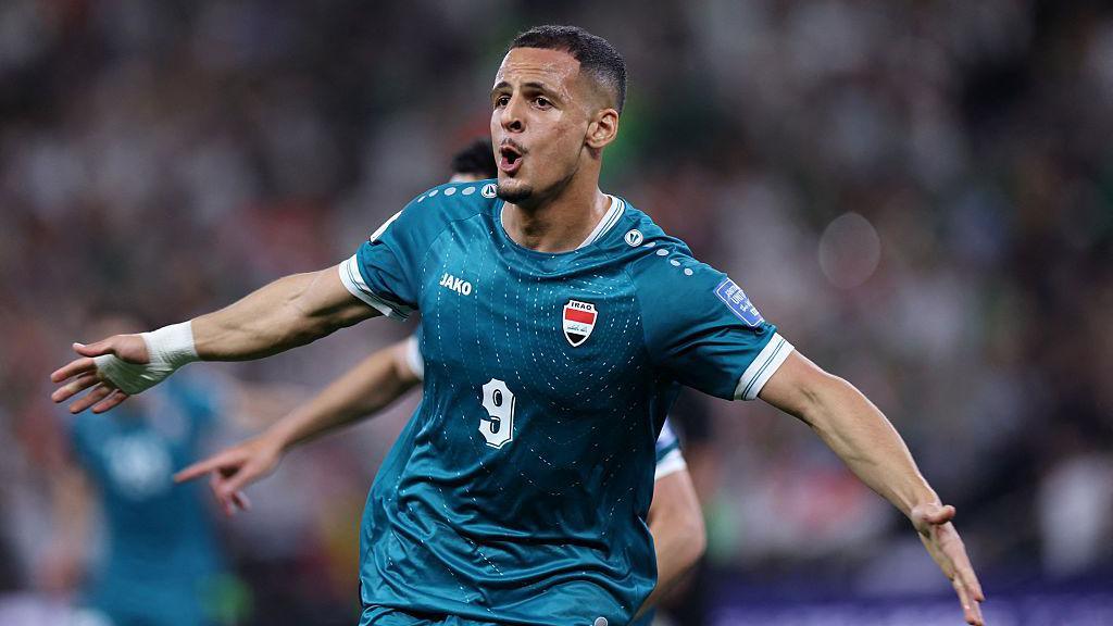 Ali Al-Hamadi celebrates scoring during the 2026 World Cup qualifiers final play-off football match between Iraq and Bolivia