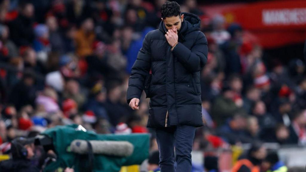 Ruben Amorim looks dejected following Manchester United's defeat to Brighton