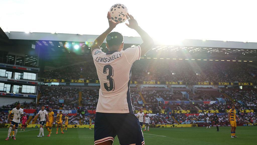 Myles Lewis-Skelly takes a throw-in against Andorra