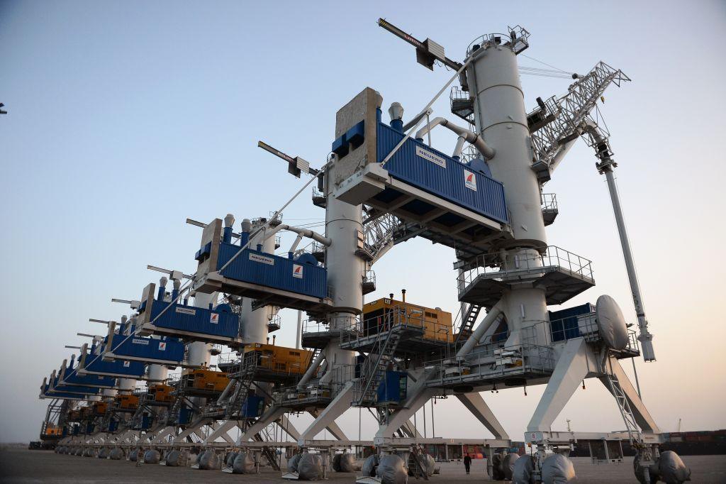 Officials attend an inauguration ceremony for the first export convoy to India via Iran at Chabahar seaport in Chabahar, Iran on February 25, 2019.