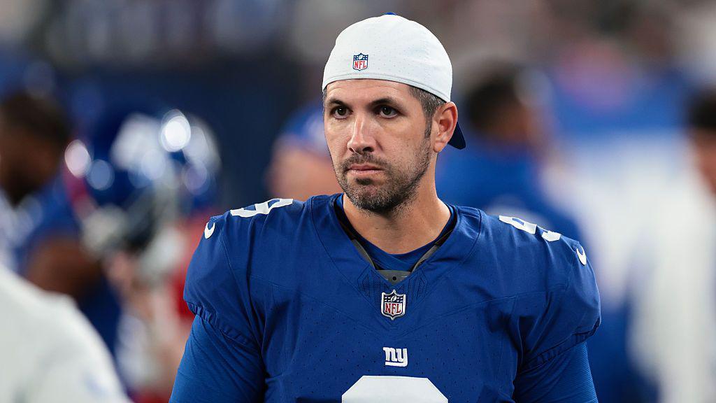 Graham Gano looks on