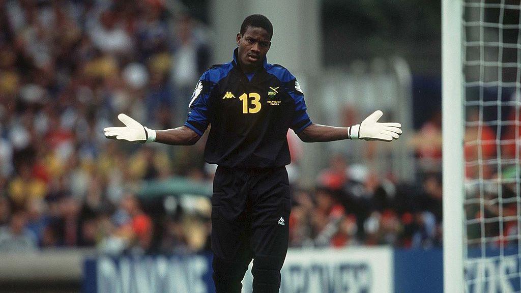 Aaron Lawrence playing in goal for Jamaica