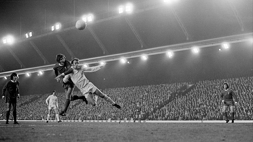John Toshack of Liverpool leaps high to ihead towards goal during the League Cup fourth round match between Liverpool and Leeds United at Anfield on October 31, 1972 in Liverpool, England