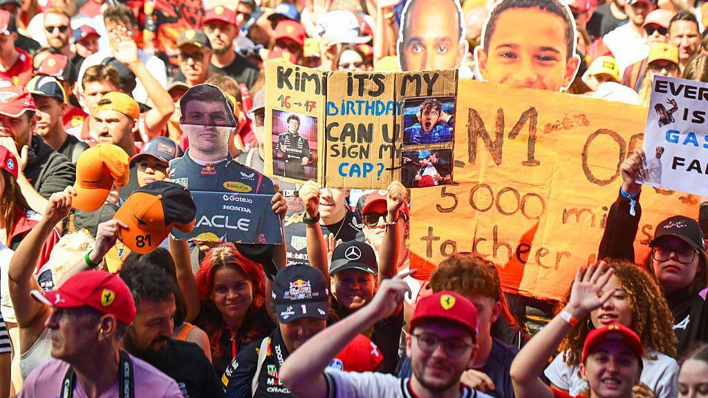 Fans hold up signs for Lewis Hamilton and Kimi Antonelli in Belgium 