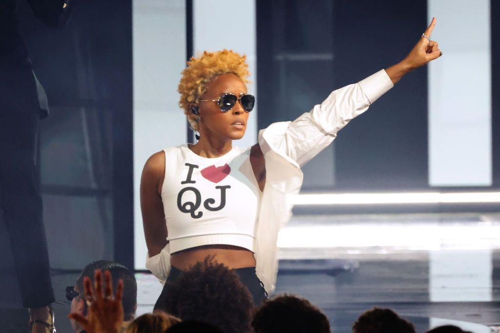 Janelle Monaé wears a t-shirt bearing the text "I heart QJ" in tribute to Quincy Jones