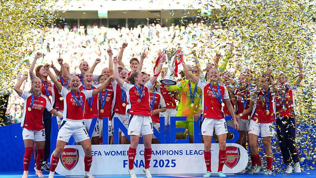 Arsenal players celebrate winning the Champions League