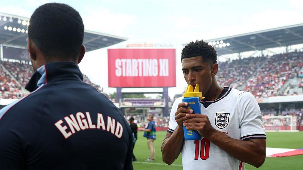 England's Jude Bellingham takes a drink during the pre-World Cup friendly against Costa Rica in Orlando.