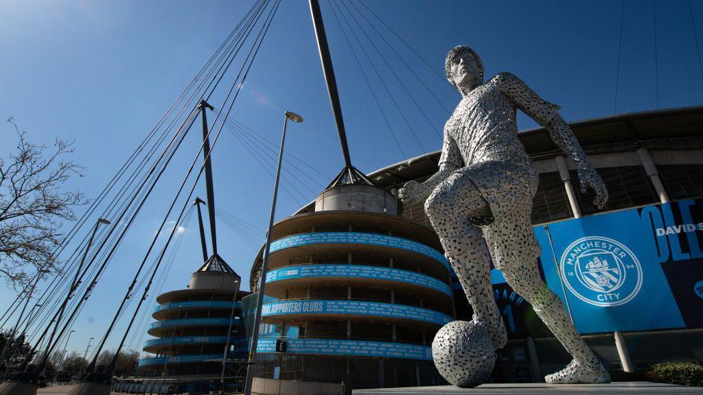 A statue of former player David Silva 