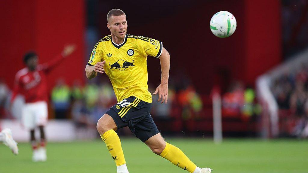 Nico Elvedi of Leeds United chases a loose ball