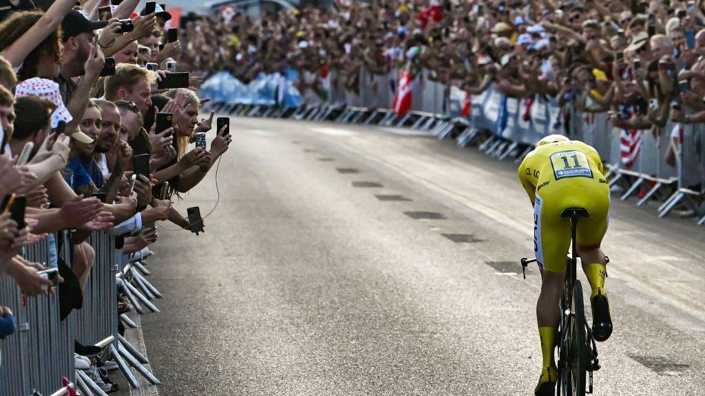 Last year's men' champion Tadej Pogacar cycling in Nice