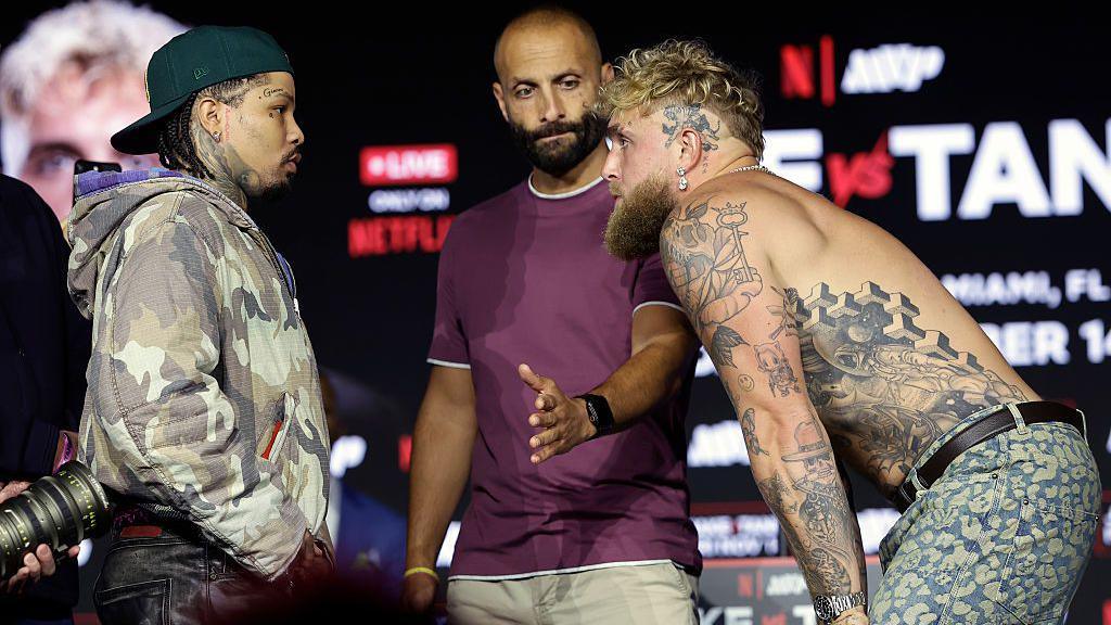 Gervonta Davis and a topless Jake Paul face off