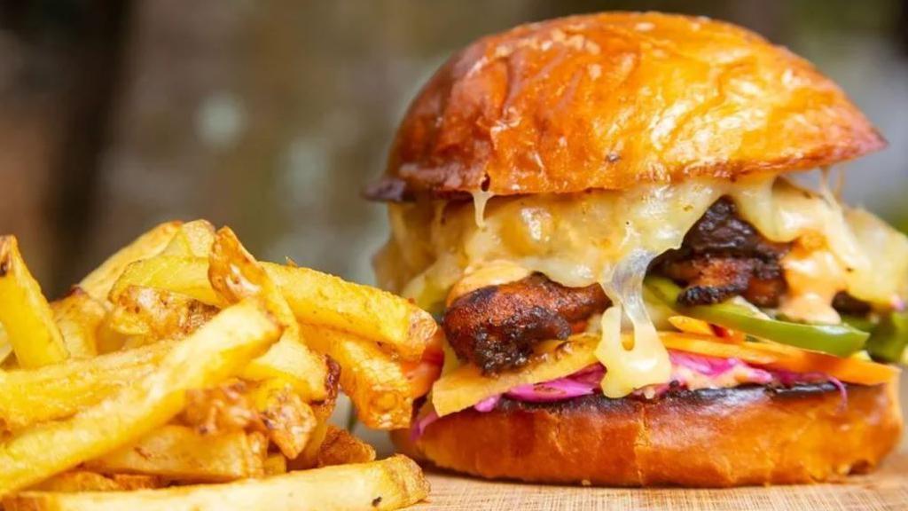 Chips and a burger with salad