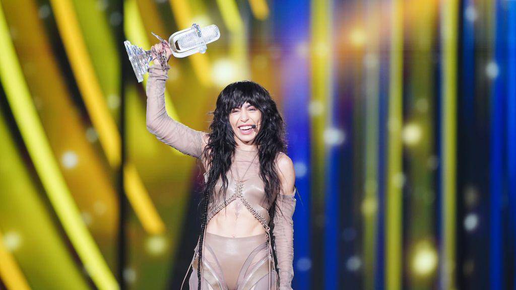 Loreen holding the trophy in 2023