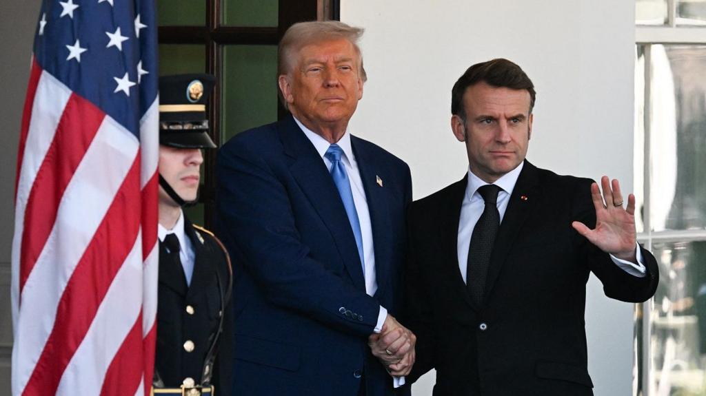 Trump and Macron shake hands