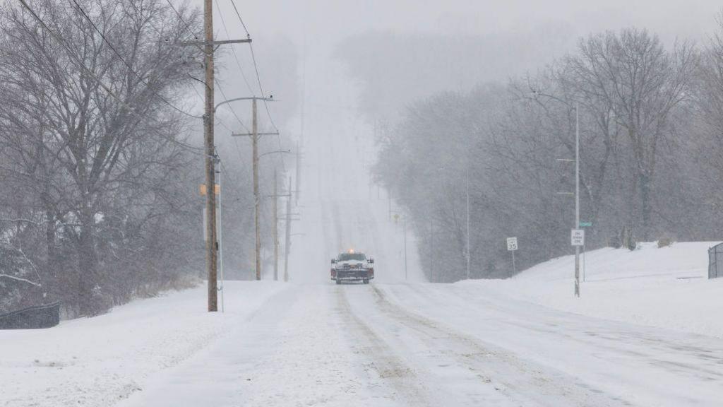 Snow covered road in Kansas. 