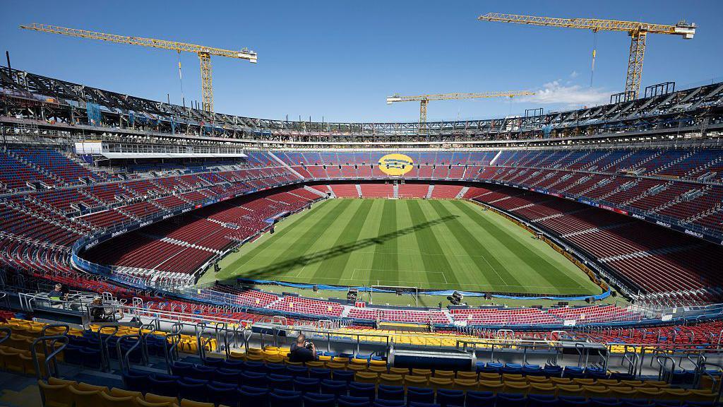 Cranes above the Nou Camp in Barcelona 