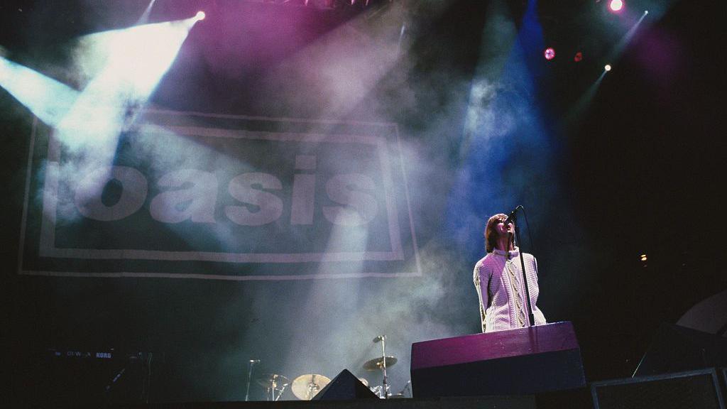 Oasis performing at Knebworth.