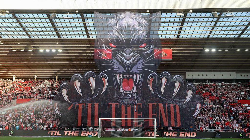 A Tifo saying 'Til the End' on display at the Stadium of Light