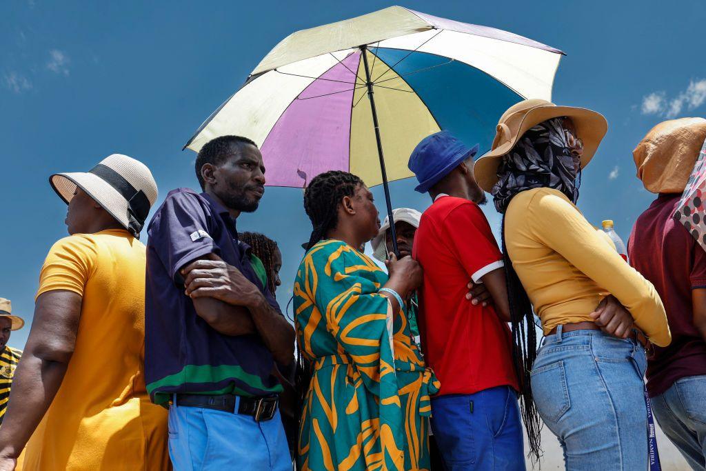 Voters queue at a polling station at the Sam Nujoma stadium in Windhoek on 27 November 2024 during Namibia's general election