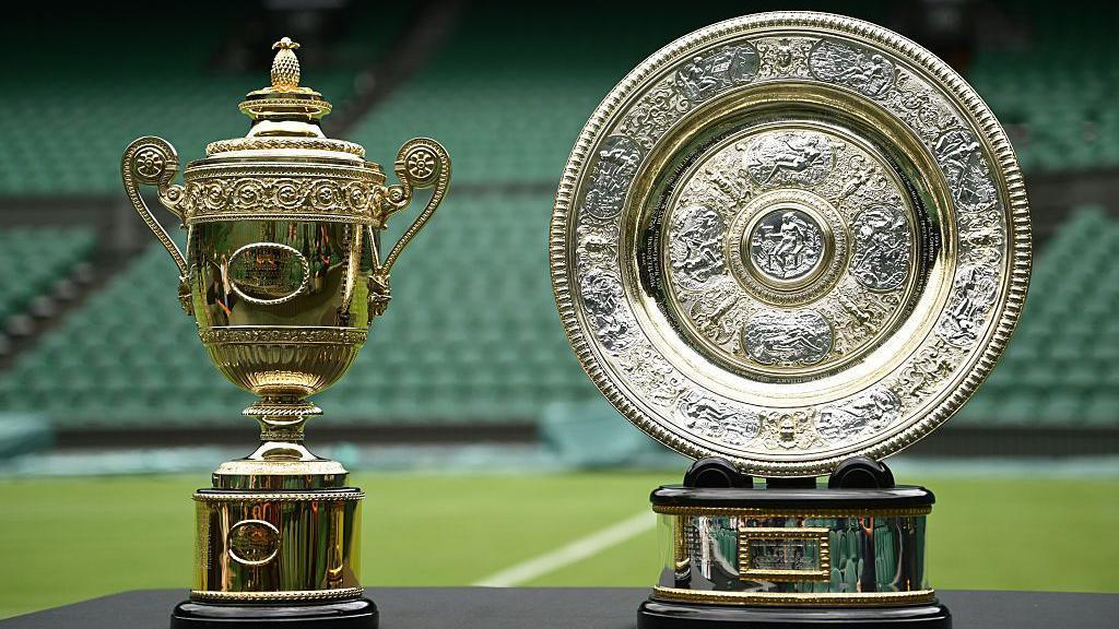 The men's and women's trophies for the 2025 Wimbledon Championships