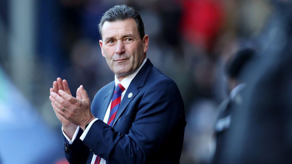 Tommy Widdrington, Manager of Aldershot Town, looks on prior to the Emirates FA Cup Third Round match between West Bromwich Albion and Aldershot Town at The Hawthorns 