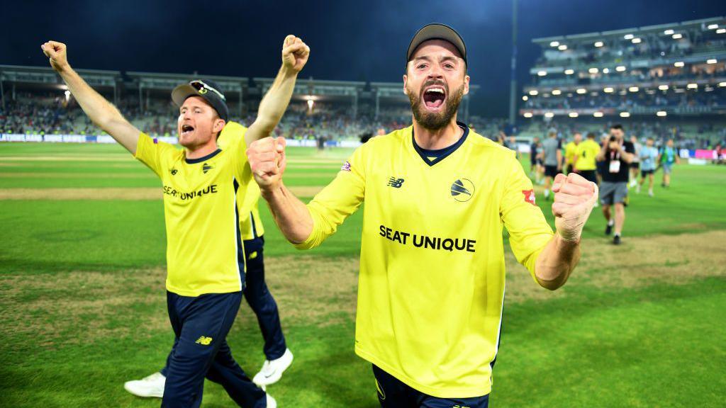 James Vince (right) and Liam Dawson (left) celebrate winning the T20 Blast with Hampshire