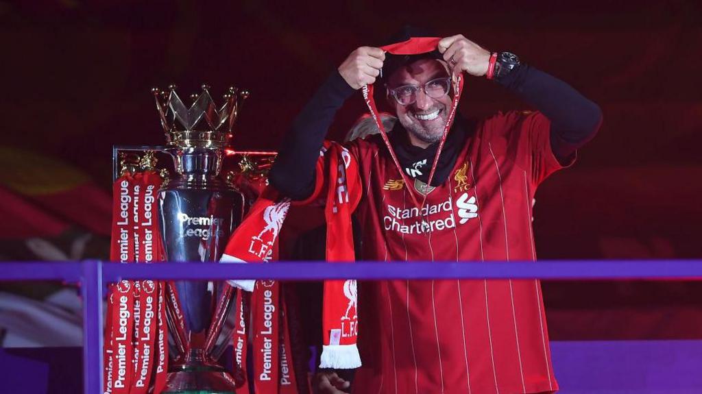 Then Liverpool boss Jurgen Klopp celebrates winning the Premier League