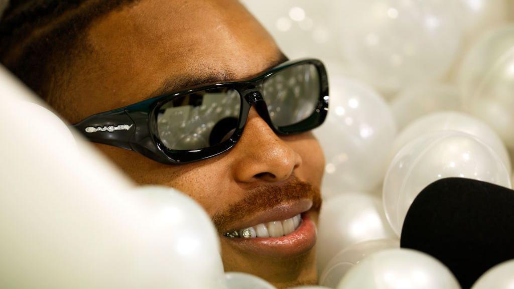 Minnesota Vikings wide receiver Justin Jefferson having fun in a ball pit