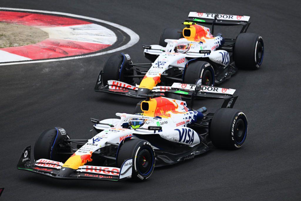 Racing Bulls' Isack Hadjar leads team-mate Yuki Tsunoda around a corner during the Chinese Grand Prix