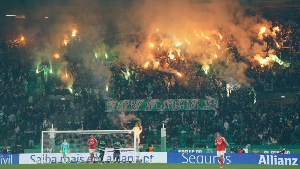 Sporting CP supporters in action during the Liga Portugal Betclic match between Sporting CP and SL Benfica at Estadio Jose Alvalade on December 29, 2024 
