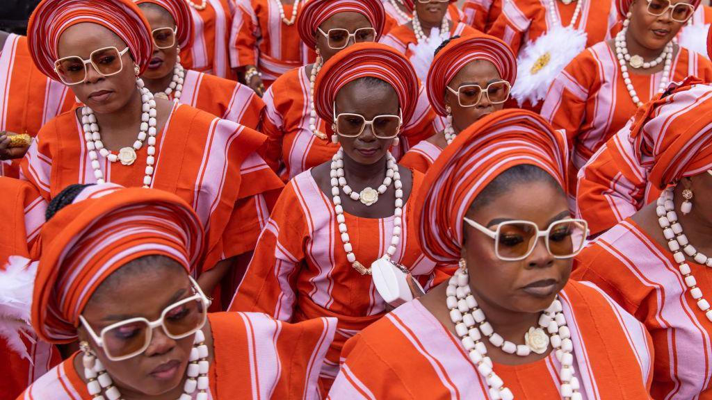 Members of the Egbe Obaneye Obinrin parade to pay homage to the King, Awuja Ile of Ijebuland, during the annual Ojude Oba festival in Ijebu Ode on June 18, 2024. Ojude Oba festival is an ancient festival celebrated by the Yoruba people of Ijebu Ode, a town in Ogun State Nigeria. This annual festival usually takes place the third day after Eid El Kabir to pay homage and show respect to the King the Awujale of Ijebuland.