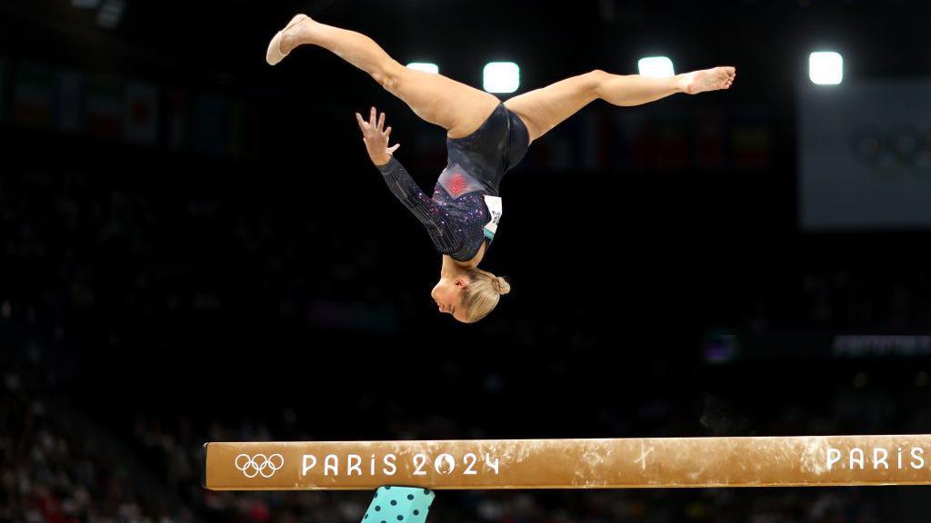 Ruby Evans of Team Great Britain competes on the balance beam during the Artistic Gymnastics 