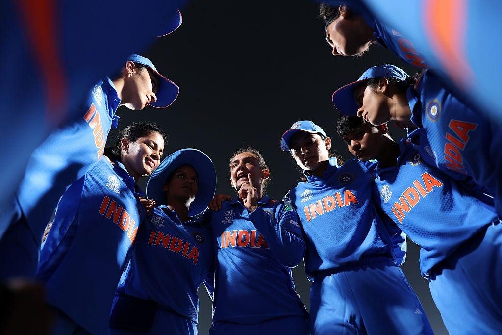 India captain Harmanpreet Kaur speaks to the team in a huddle before the Women's Cricket World Cup match against Australia in Visakhapatnam
