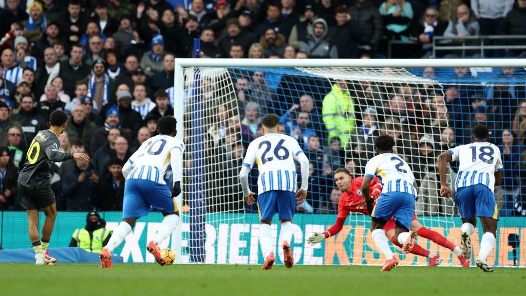 Iliman Ndiaye scores from the penalty spot in Everton's Premier League game at Brighton & Hove Albion