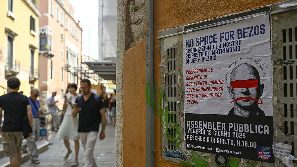 An anti-Jeff Bezos poster in a Venice street