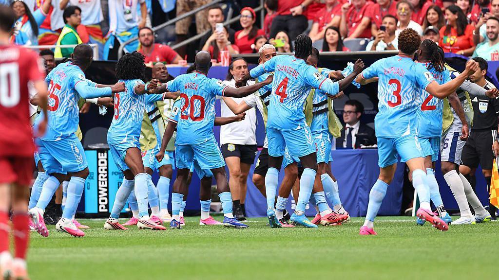 DR Congo players dance in celebration after equalising in the 1-1 draw with Portugal at the 2026 FIFA World Cup