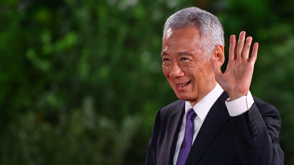 Singapore's former prime minister Lee Hsien Loong gestures during the swearing-in ceremony of his successor Lawrence Wong at the Istana in Singapore on May 15, 2024. 