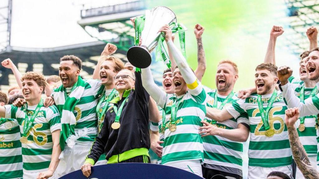 Celtic Interim Manager Martin O'Neill and Callum McGregor lift the league title during a William Hill Premiership match between Celtic and Heart of Midlothian at Celtic Park, on May 16, 2026, in Glasgow, Scotland