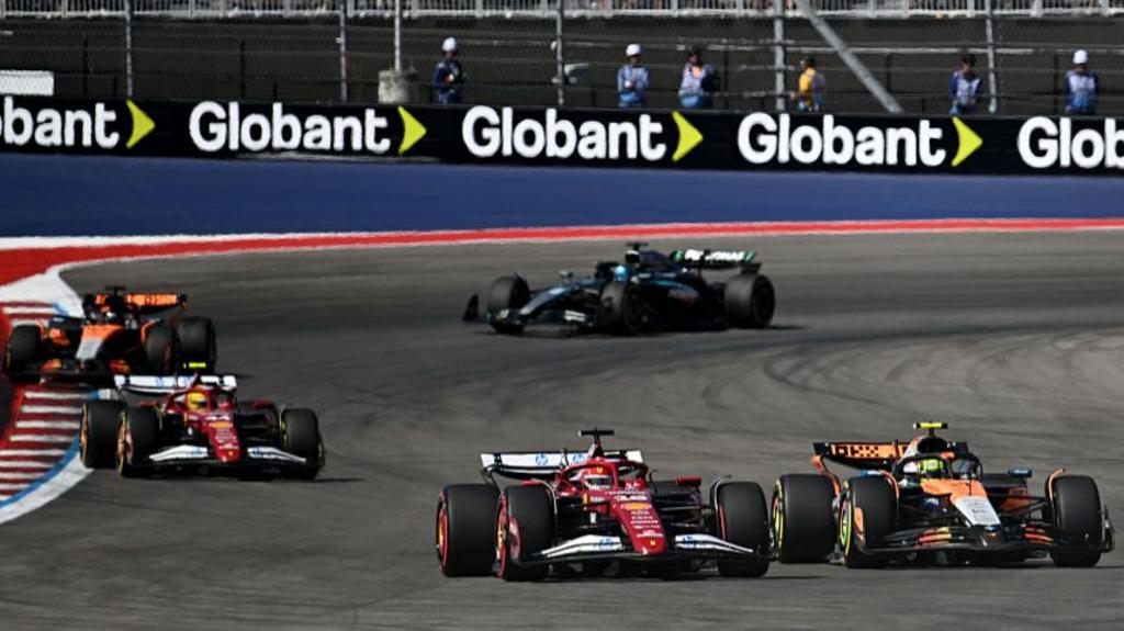 McLaren's Lando Norris challenges Ferrari's Charles Leclerc during the United States Grand Prix